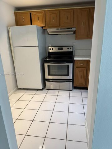484 NW 165th St Road A-311, Miami, FL 33169