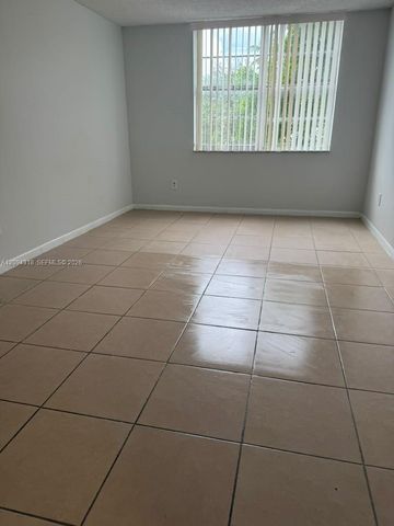 484 NW 165th St Road A-311, Miami, FL 33169