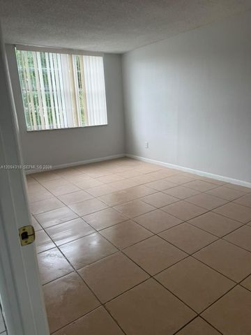 484 NW 165th St Road A-311, Miami, FL 33169