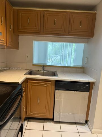 484 NW 165th St Road A-311, Miami, FL 33169