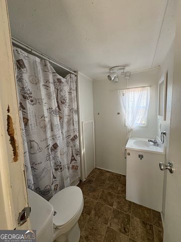 3195 Henderson Grove Road, Sandersville, GA 31082