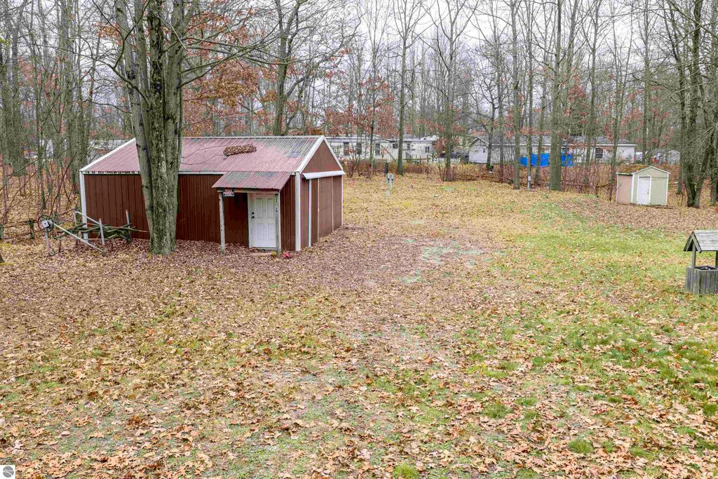 Image 1 of property listing at 7737 Wilderness Drive, Weidman, MI 48893