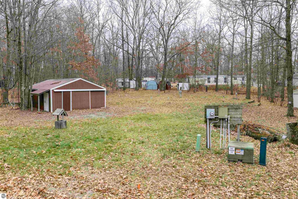 Image 2 of property listing at 7737 Wilderness Drive, Weidman, MI 48893