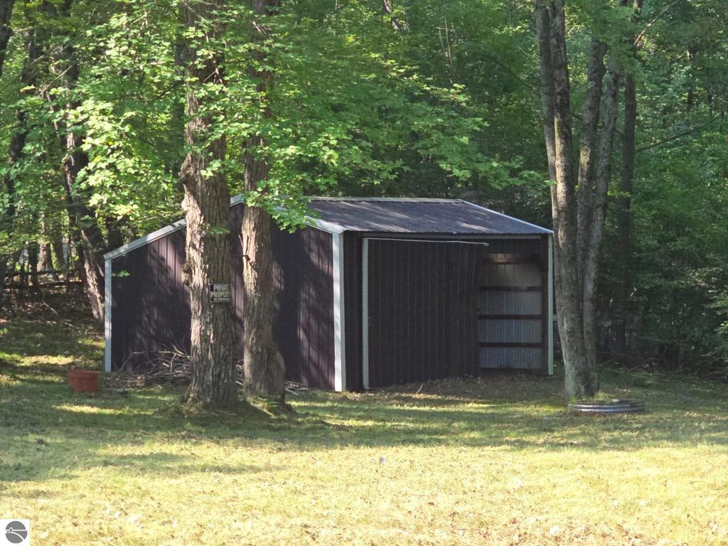 Image 26 of property listing at 7737 Wilderness Drive, Weidman, MI 48893