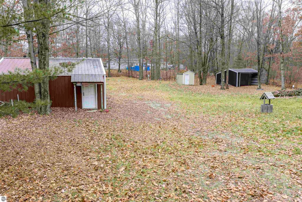 Image 3 of property listing at 7737 Wilderness Drive, Weidman, MI 48893