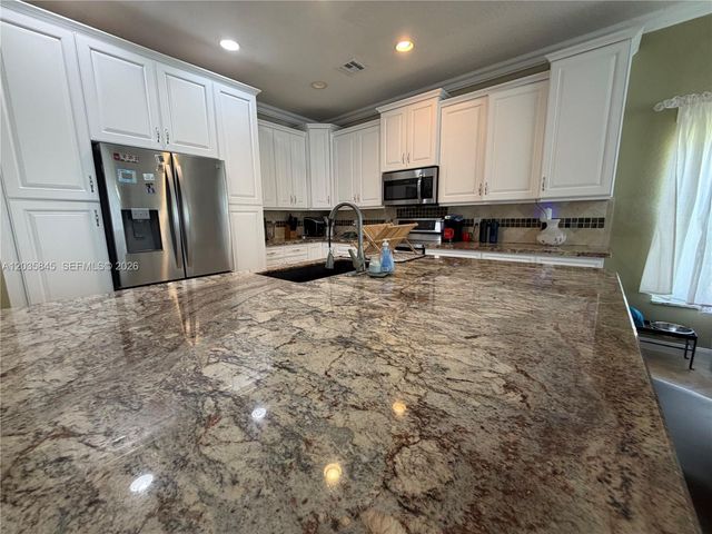 11927 NW 47th Street, Coral Springs, FL 33076