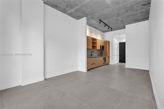 91 NW 27th St 203, Miami, FL 33127