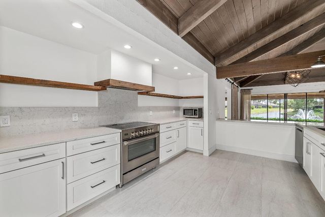 11683 Wimbledon Circle, Wellington, FL 33414