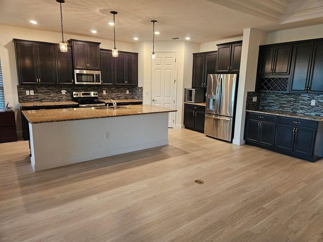 12031 SW Marigold Avenue, Port St. Lucie, FL 34987
