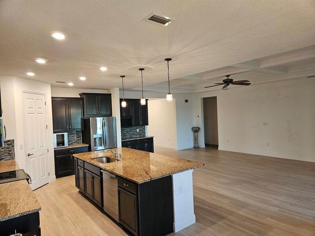 12031 SW Marigold Avenue, Port St. Lucie, FL 34987