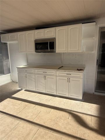 9213 CAMINO VILLA BOULEVARD, Tampa, FL 33635