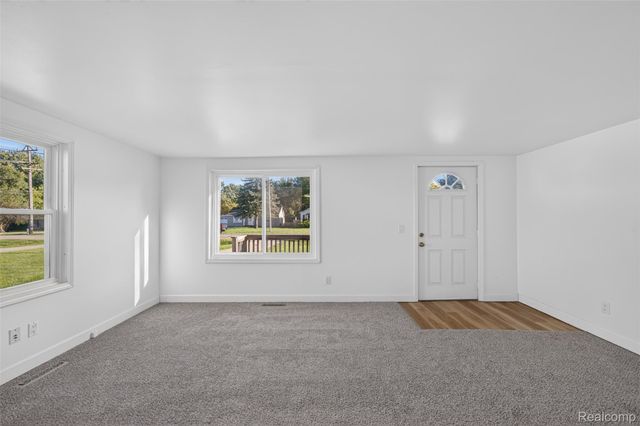 5465 Raymond Avenue, Burton, MI 48509