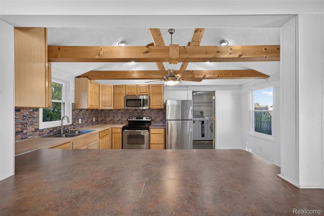 5465 Raymond Avenue, Burton, MI 48509