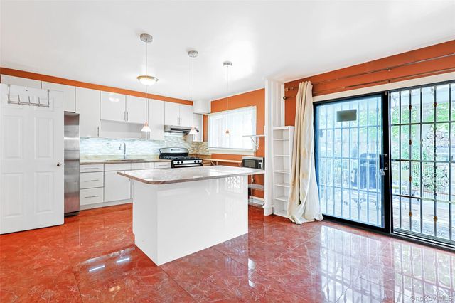 14456 Melbourne Avenue, Kew Garden Hills, NY 11367