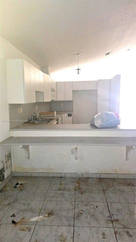 15153 NW 89th Pl, Miami Lakes, FL 33018