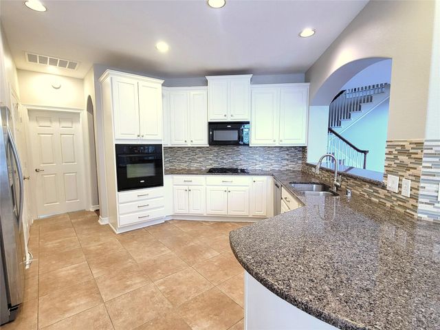 7503 Stonebridge Creek Lane, Humble, TX 77396