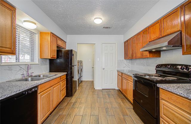 2702 Fir Crest Court, Stafford, TX 77477