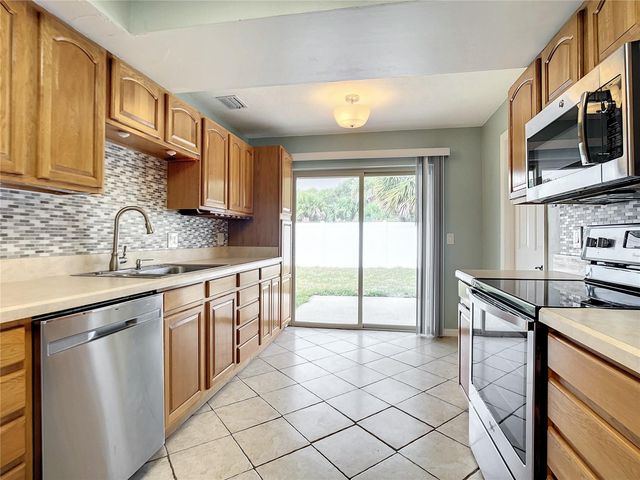 3828 SANDSTONE COURT, New Smyrna Beach, FL 32169