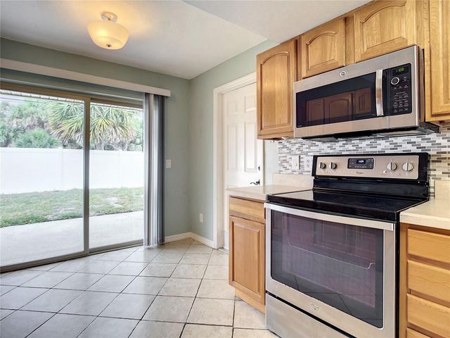 3828 SANDSTONE COURT, New Smyrna Beach, FL 32169