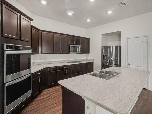 2488 BEGONIA STREET, Mascotte, FL 34753