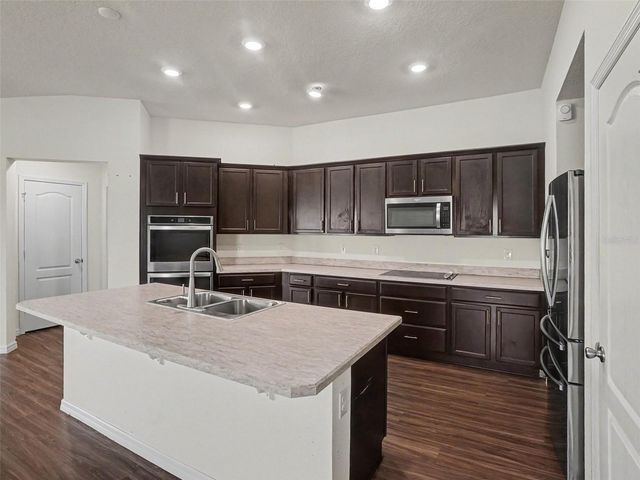 2488 BEGONIA STREET, Mascotte, FL 34753