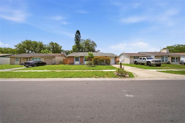 7976 SHADOW RUN DRIVE, Largo, FL 33773