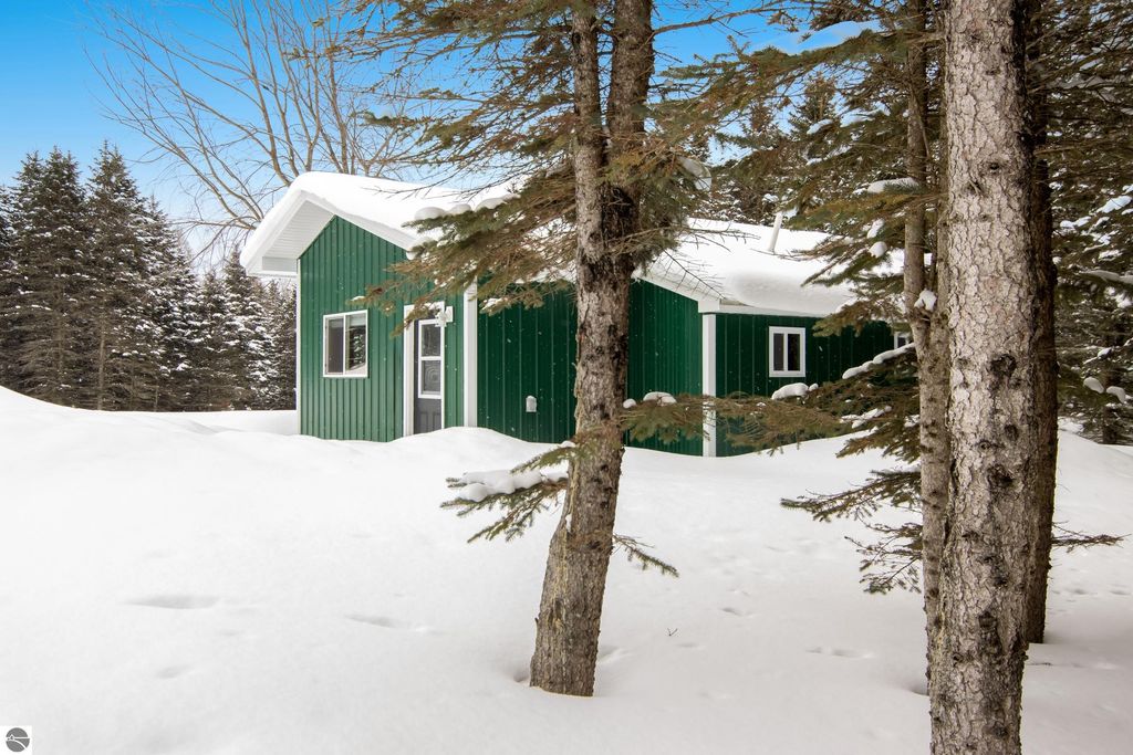 Image 1 of property listing at 9775 SW Creighton Road, Fife Lake, MI 49633