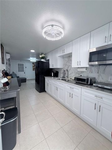 1508 W KNOLLWOOD STREET, Tampa, FL 33604