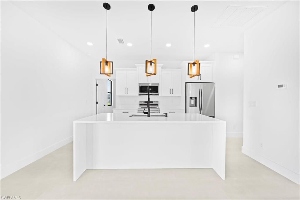 Image 10 of property listing at 1329 NE 18th TER, Cape Coral, FL 33909