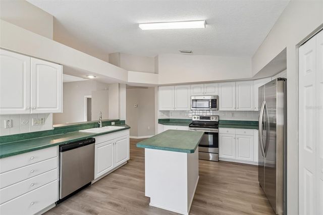 1441 WATERMILL CIRCLE, Tarpon Springs, FL 34689