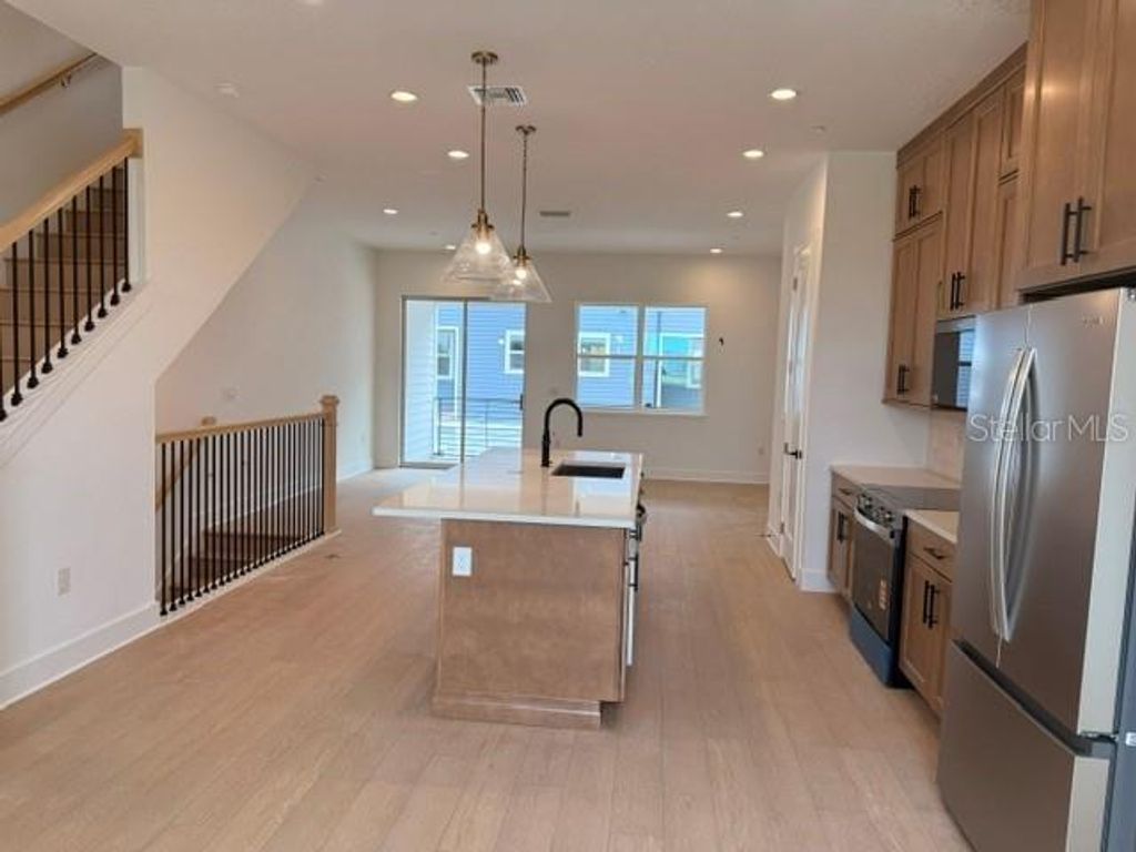 Image 4 of property listing at 9301 LUMINARY BOULEVARD, Orlando, FL 32827