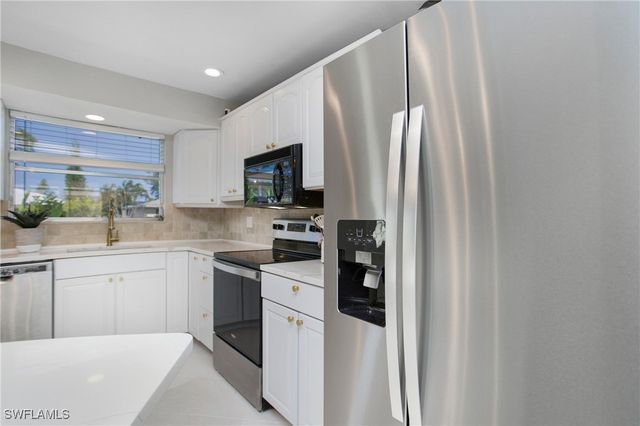 27 Pebble Beach BLVD, Naples, FL 34113
