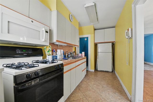 6537 77th Place, Middle Village, NY 11379