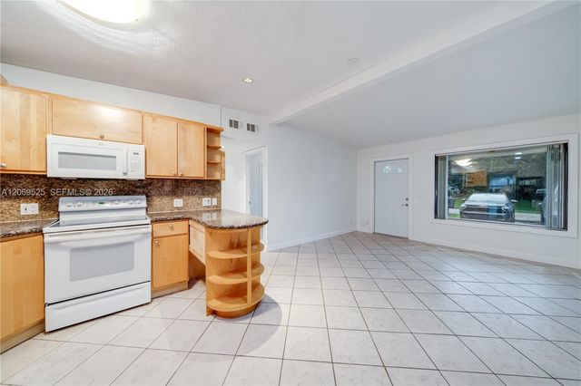 5677 Maypop Road, West Palm Beach, FL 33415