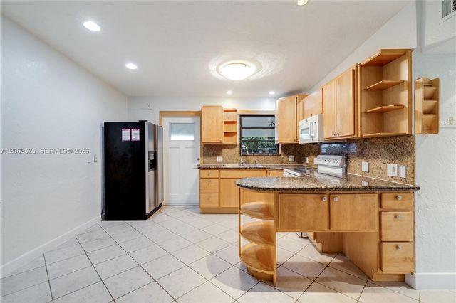 5677 Maypop Road, West Palm Beach, FL 33415