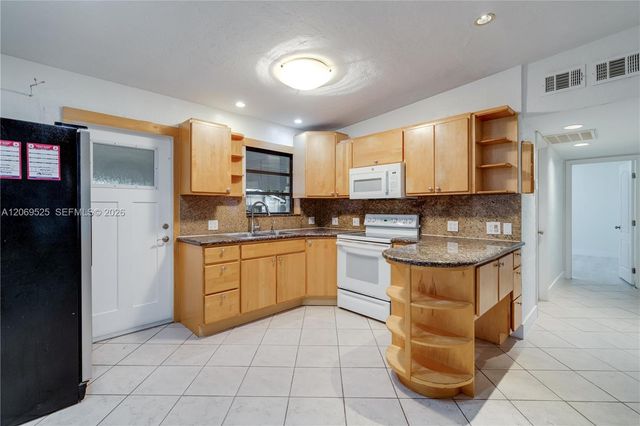 5677 Maypop Road, West Palm Beach, FL 33415