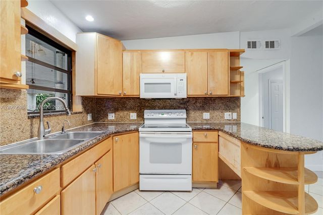 5677 Maypop Road, West Palm Beach, FL 33415