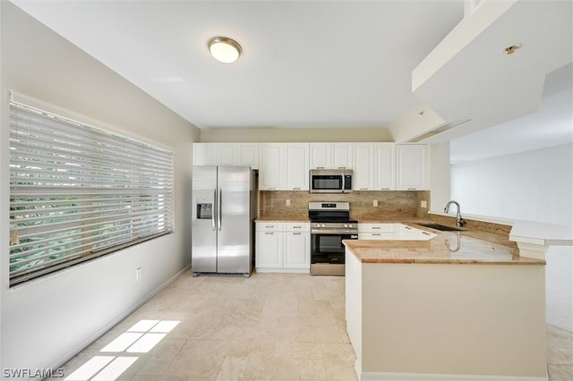 7518 Silver Trumpet LN Q101, Naples, FL 34109