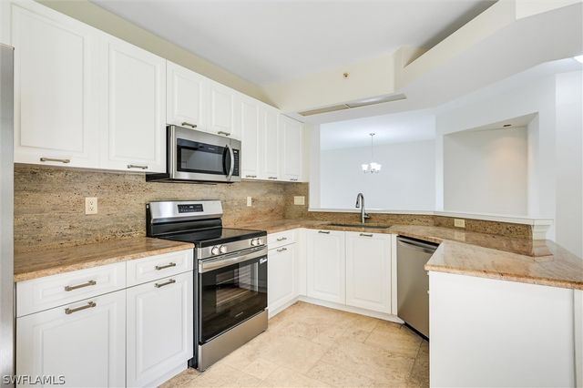 7518 Silver Trumpet LN Q101, Naples, FL 34109