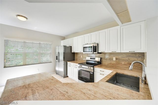 7518 Silver Trumpet LN Q101, Naples, FL 34109