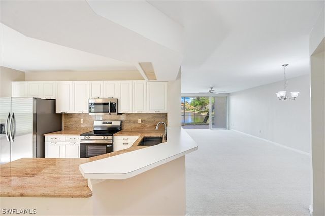 7518 Silver Trumpet LN Q101, Naples, FL 34109