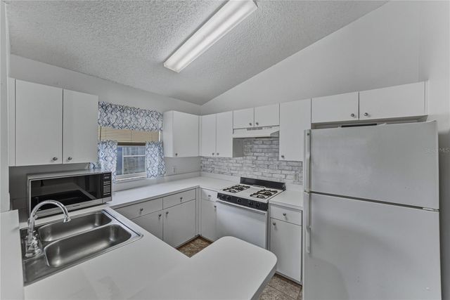 1912 FALLING STAR LANE, Lutz, FL 33549