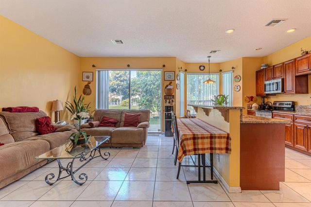 118 Rosewood Lane, Greenacres, FL 33463