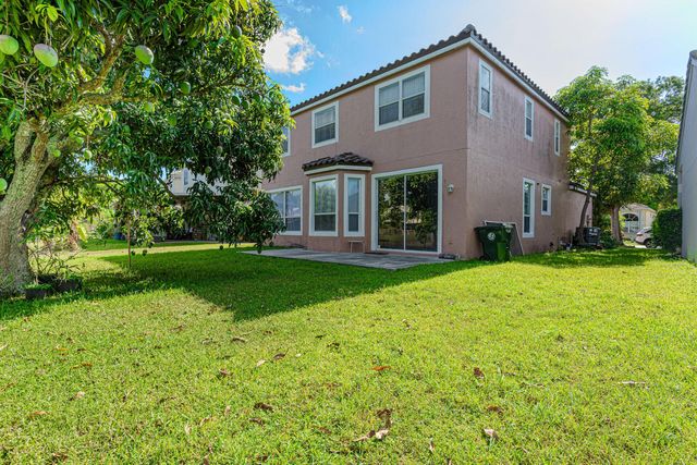 118 Rosewood Lane, Greenacres, FL 33463