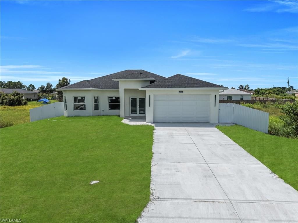 2909 63rd ST W, LEHIGH ACRES, FL 33971 — photo 2