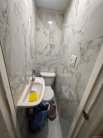9309 103rd Avenue, Ozone Park, NY 11417