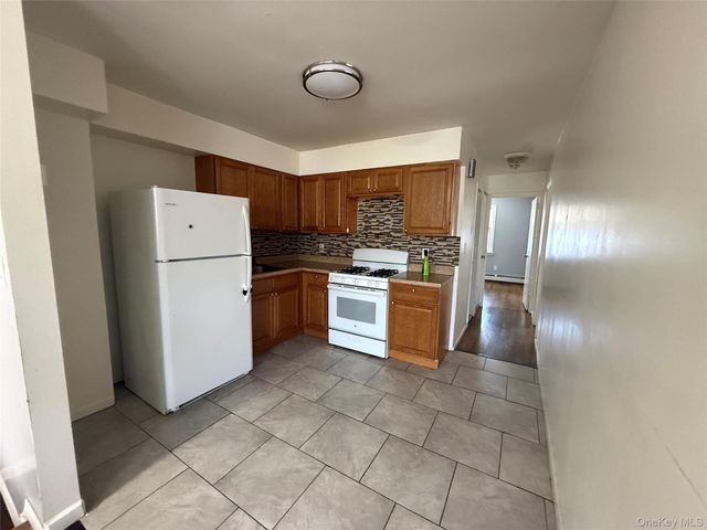 9309 103rd Avenue, Ozone Park, NY 11417