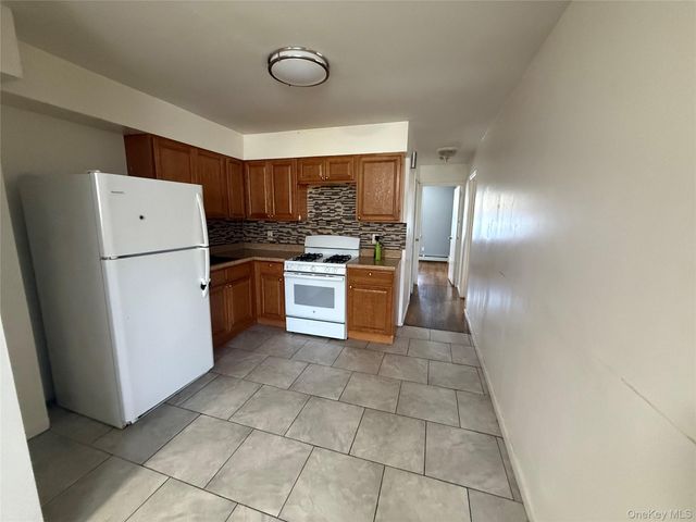 9309 103rd Avenue, Ozone Park, NY 11417