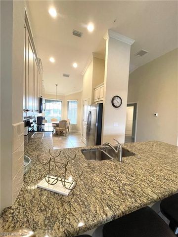 9426 Benevenuto CT 203, Naples, FL 34119