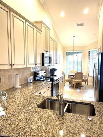 9426 Benevenuto CT 203, Naples, FL 34119
